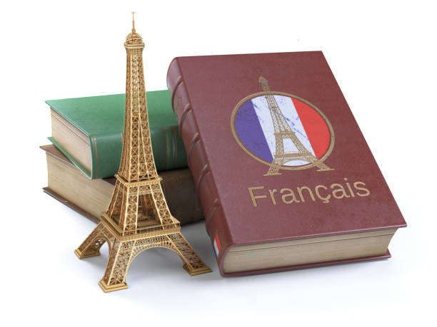 aprender y estudiar francés concepto. libro con bandera francesa y la torre eiffel, aislado en blanco. - french culture dictionary france text fotografías e imágenes de stock