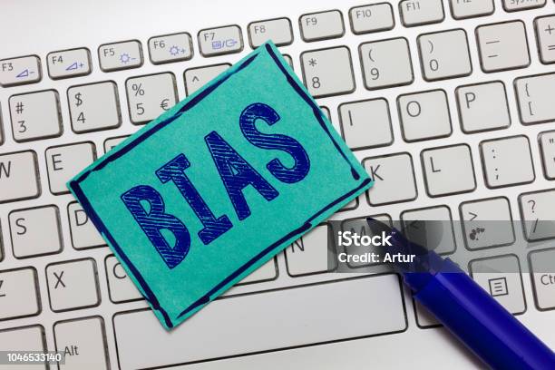Handwriting Text Bias Concept Meaning Prejudice In Favor Of And Against One Thing Considered To Be Unfair Stock Photo - Download Image Now