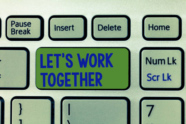 istock Writing note showing Let s is Work Together. Business photo showcasing Unite and Join Forces to Achieve a Common Goal 1046534180