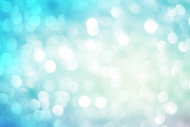 rozmycie niebieski kolor tła z ruchu srebrny bokeh efekt świetlny dla projektowania jako szczęśliwa karta nowego roku, wesołych świąt, baner, koncepcja reklam - glitter defocused illuminated textured effect zdjęcia i obrazy z banku zdjęć