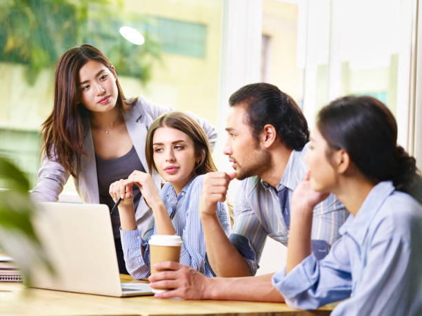 istock young entrepreneurs working together in office 1046537270
