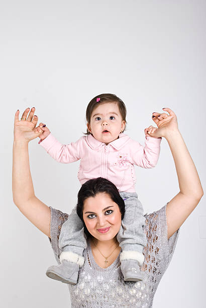 istock Baby on mother shoulders 104653770
