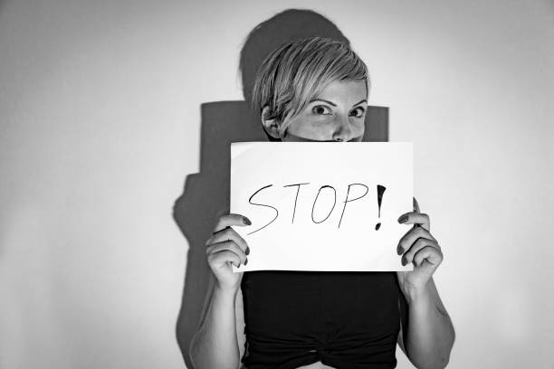 istock woman with sign 1046540024