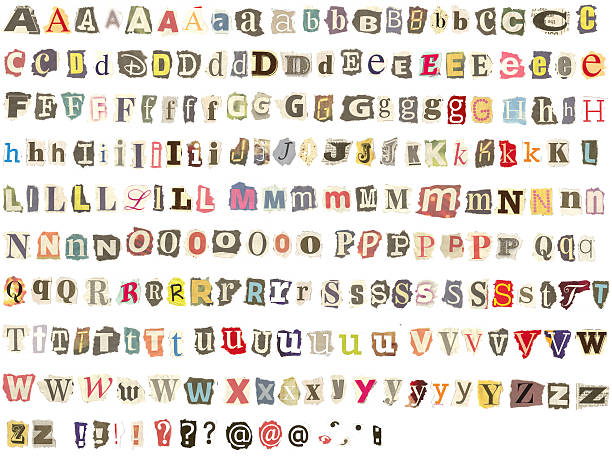 Colorful alphabet with letters torn from newspapers and magazines stock photo