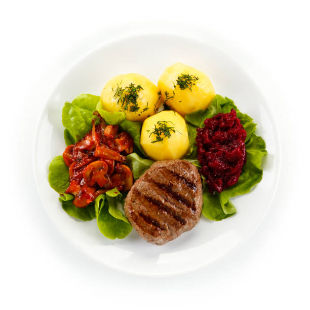 Grilled steak with boiled potatoes and beetroots