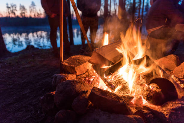 istock Fireplace in camping near lake 1046543908