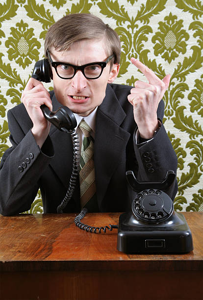 istock Angry nerd on the phone 104654435