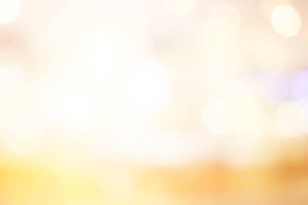 istock blurred shopping mall in light warm tone with bokeh light background 1046544358