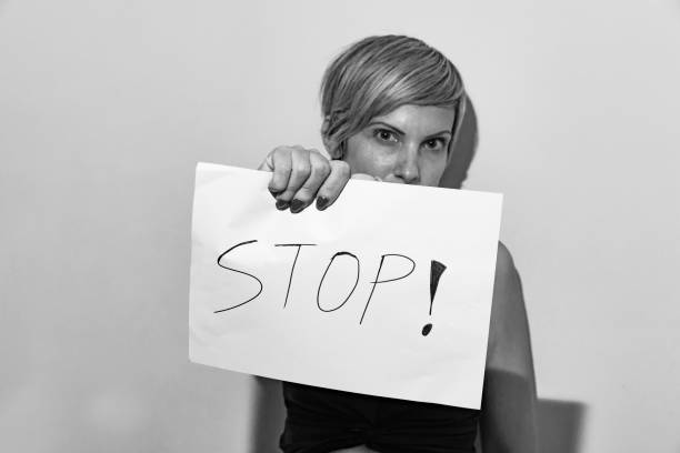 istock woman with sign 1046544582