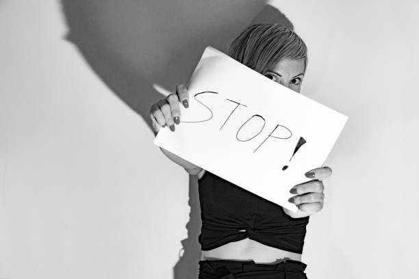 istock woman with sign 1046547128