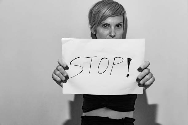 istock woman with sign 1046550518