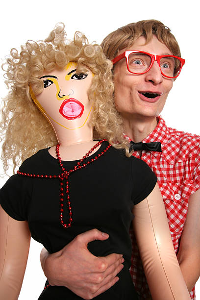 Nerd and his blow up girlfriend  blow up doll stock pictures, royalty-free photos & images
