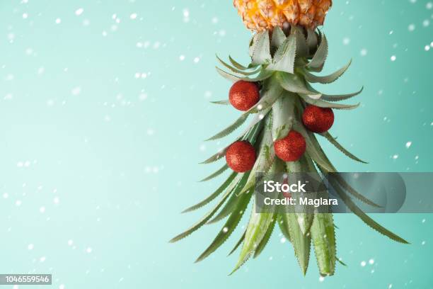 Christmas Holiday Concept With Pineapple As Alternative Christmas Tree With Copy Space Stock Photo - Download Image Now