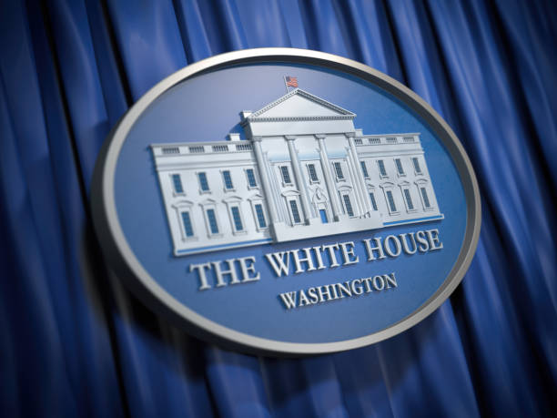 istock The White House Washington sign on blue background 1046560842