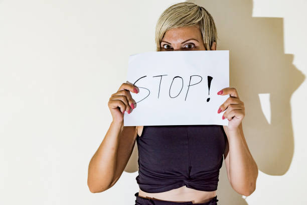 istock woman with sign 1046560998