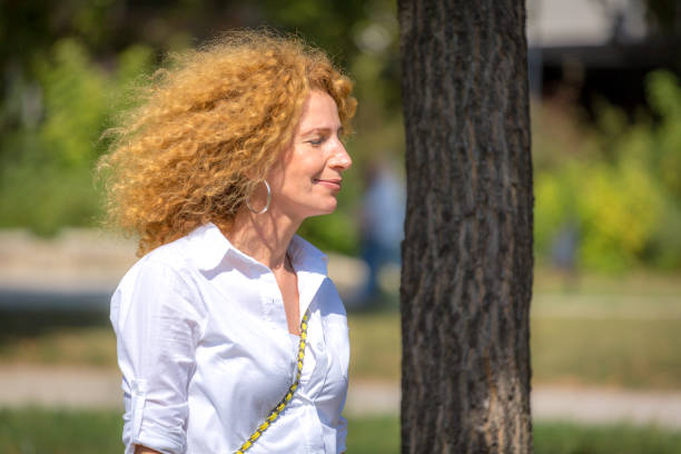 istock Woman with curly hair 1046563498