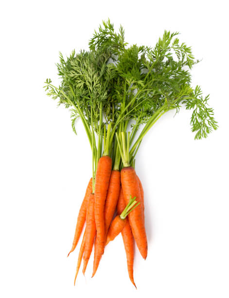 istock Fresh carrot heap vegetables isolated on white 1046570794