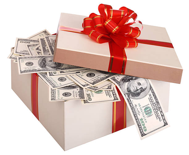 Gift box with banknote of dollar. stock photo