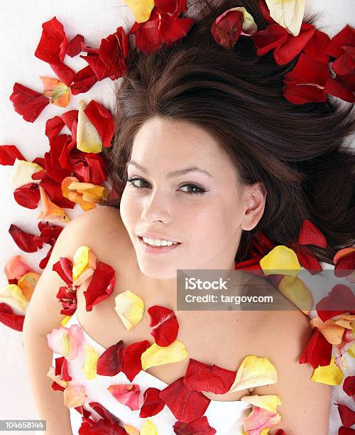 Beautiful Girl In Rose Petal Spa Stock Photo - Download Image Now - Adult, Adults Only, Alternative Therapy