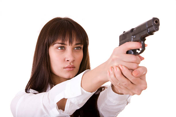 istock Beautiful young woman with gun. 104658170