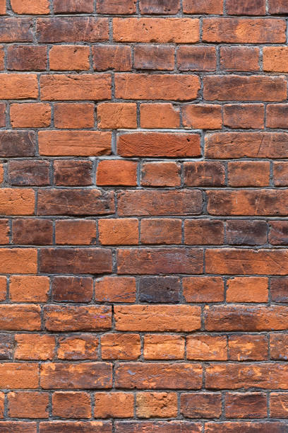 istock Abstract weathered stained background of brick wall texture, grungy architecture wallpaper 1046582004