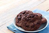 Close up image of soft baked dark chocolate cookies