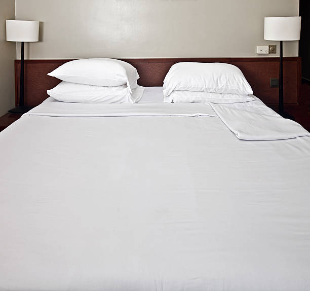 istock Luxury bedroom with white bedding. 104658291