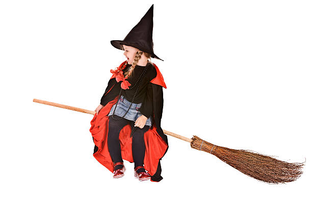 istock Child in costume witch with black hat fly on broom. 104658455
