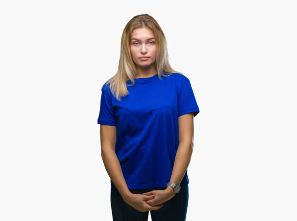 istock Young caucasian woman over isolated background with serious expression on face. Simple and natural looking at the camera. 1046591082