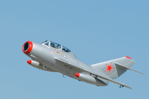 Airplane flying on blue sky