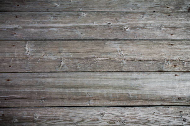 istock Old gray rustic wooden background. Space for your text 1046597534