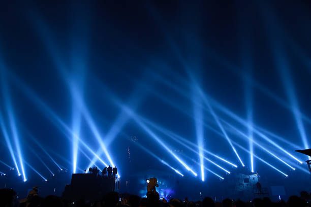 Image of blue stage lights at the concert