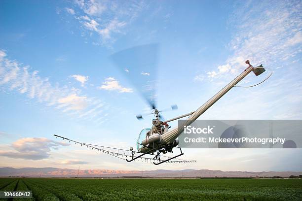 Crop Dusting In Cochella Valley Stock Photo - Download Image Now - Crop - Plant, Helicopter, Blue
