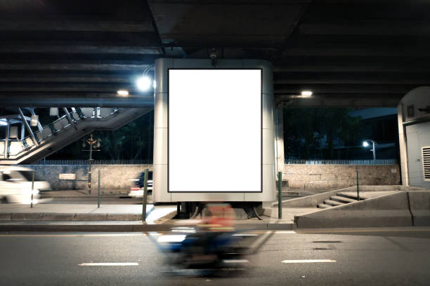Blank Poster display advertisement on street. Blank Poster display advertisement on street.Empty poster under Overpass and Night light traffic. banner commercial sign outdoors marketing stock pictures, royalty-free photos & images