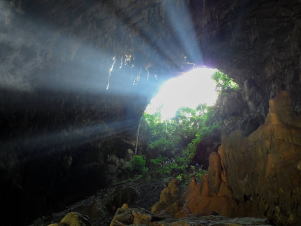 istock Cave entrance and sunbeams 1046614044