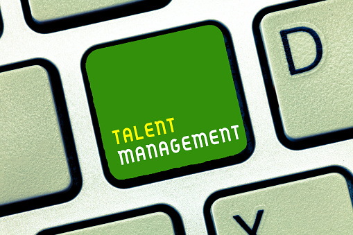 Writing note showing Talent Management. Business photo showcasing Acquiring hiring and retaining talented employees.