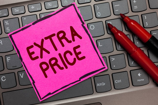 istock Text sign showing Extra Price. Conceptual photo extra price definition beyond the ordinary large degree Pink paper keyboard Inspiration communicate ideas messages Red markers. 1046618708