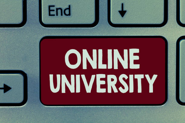 istock Handwriting text Online University. Concept meaning Distance Learning Courses are taken over the internet 1046618764