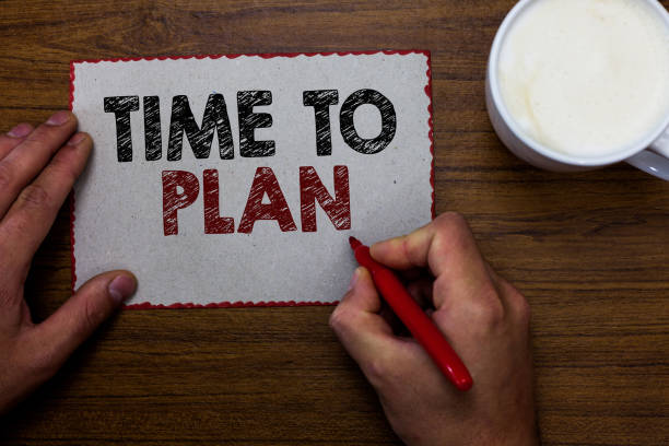 istock Word writing text Time To Plan. Business concept for Preparation of things Getting Ready Think other solutions Man holding marker communicating ideas piece paper wooden table cup coffee. 1046619036
