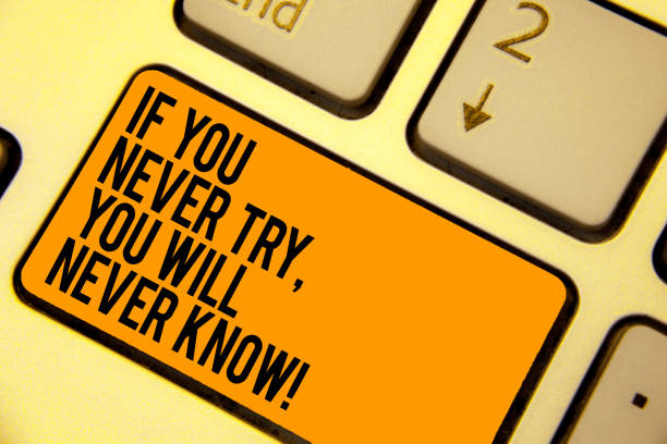 istock Handwriting text writing If You Never Try, You Will Never Know. Concept meaning Inspiration to make new thing Keyboard orange key Intention create computer computing reflection document. 1046619264