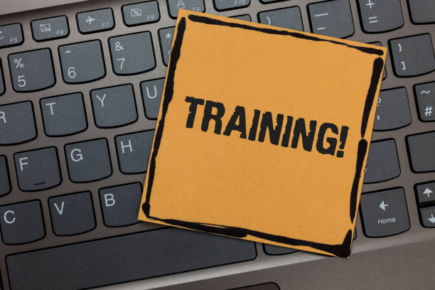 istock Handwriting text writing Training Motivational Call. Concept meaning Organized activity to develop skill set of people Black laptop keyboard art paper computer notebook netbook keypad key. 1046619948