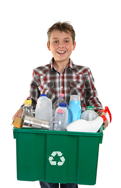 istock Happy boy carrying rubbish for recycling 104661996