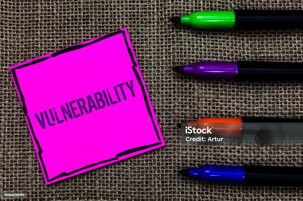 Writing note showing Vulnerability. Business photo showcasing Information susceptibility systems bug exploitation attacker Marker pens art pink paper nice mat love thought black shadow memories. Writing note showing Vulnerability. Business photo showcasing Information susceptibility systems bug exploitation attacker Marker pens art pink paper nice mat love thought black shadow memories Vulnerability Stock Photo