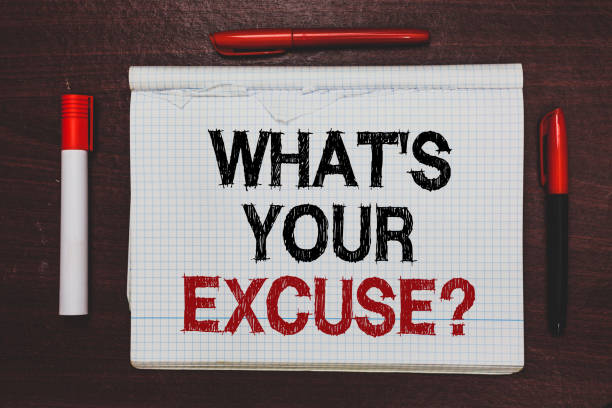 istock Handwriting text writing What s is Your Excuse question. Concept meaning Explanations for not doing something Inquiry Written black, red words notepad on brown stage white highlighter red pens. 1046622880