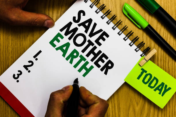 istock Handwriting text Save Mother Earth. Concept meaning doing small actions prevent wasting water heat energy Diary pen notepad ring pen marker pointer script daily work handwriting. 1046623048