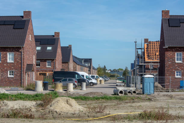 istock New residential district street left almost finished 1046624208