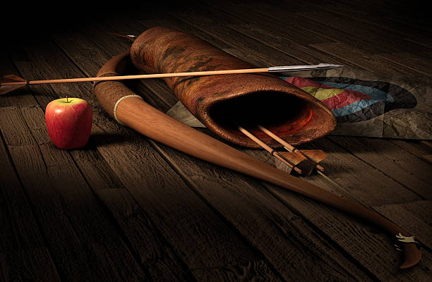 istock Archery set with a target and an apple on a wooden floor 104662811