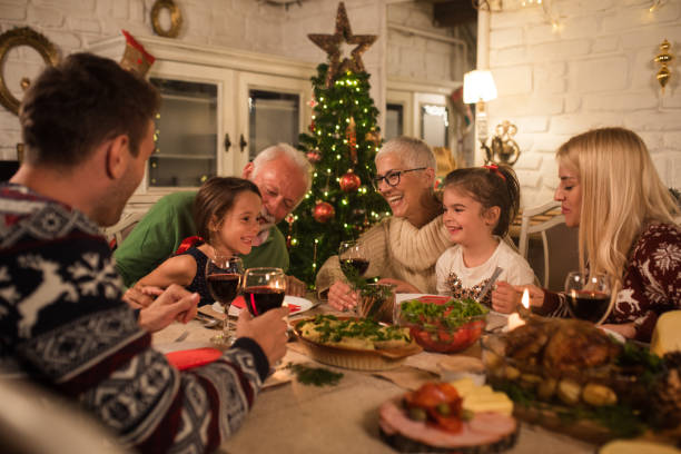 istock Family having Christmas dinner together 1046628184
