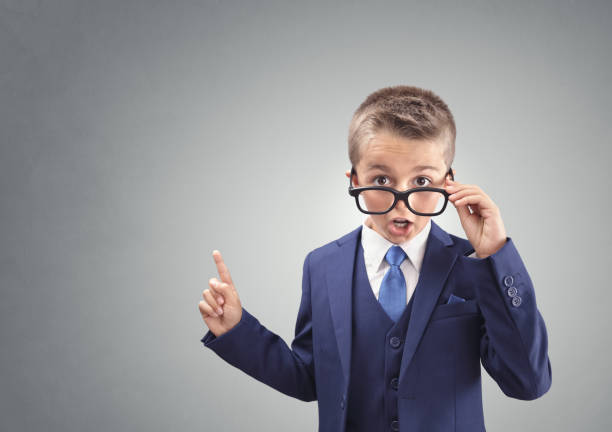 Shocked and surprised young confident executive businessman boy Shocked and surprised young confident executive businessman boy with copy space concept for amazement, astonishment, stunned and speechless bossy stock pictures, royalty-free photos & images