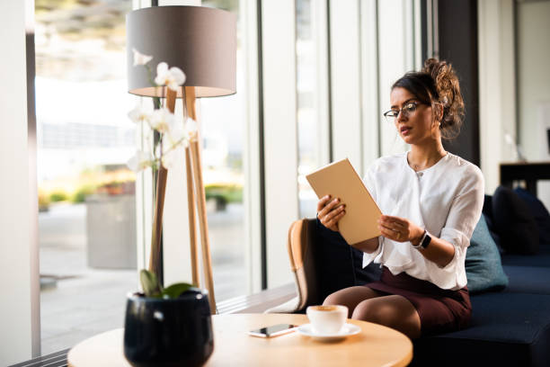 istock Businesswoman working on tablet computer. 1046631620